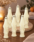 Handgefertigte Geisterkerzen in Creme und Hellgelb für Halloween von Flomati